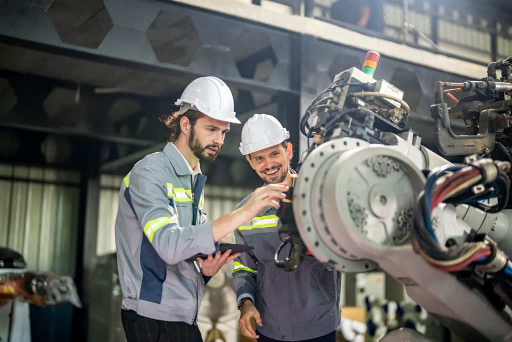 engineer inspecting automatic ai robot arm and mac 2023 11 27 05 31 41 utc